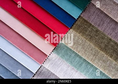Bright collection of colorful textile samples. Fabric swatches, set in ...