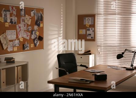 Detective workplace and evidence board in modern office Stock Photo - Alamy