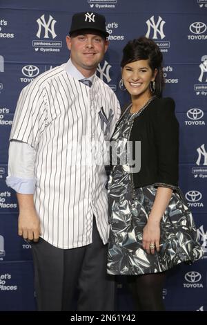 Brian McCann and his wife Ashley McCann at a news conference at