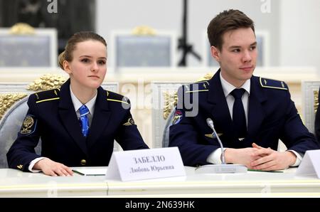 Moscow, Russia. 09th Feb, 2023. Students from Moscow State Technical University of Civil Aviation and Saint-Petersburg State Civil Aviation University listen to Russian President Vladimir Putin during a meeting with representatives of the professional aviation community to mark the 100th anniversary of domestic civil aviation at the State Kremlin Palace, February 9, 2023 in Moscow, Russia. Credit: Mikhail Metzel/Kremlin Pool/Alamy Live News Stock Photo