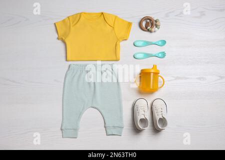 Flat lay composition with baby food and accessories on white background  Stock Photo - Alamy