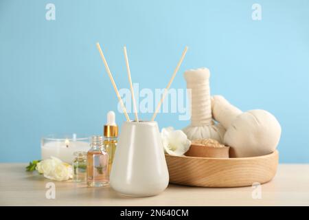 Beautiful composition with spa items on wooden table Stock Photo