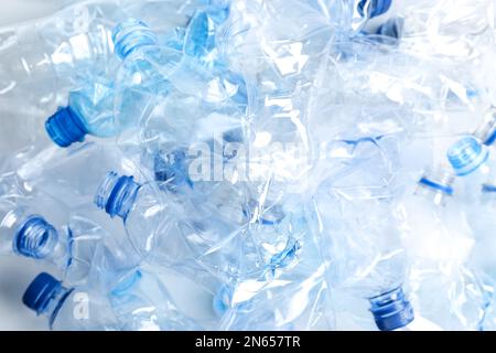 Many used plastic bottles as background, closeup. Recycling problem Stock Photo