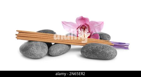 Aromatic incense sticks, spa stones and orchid flower on white background Stock Photo