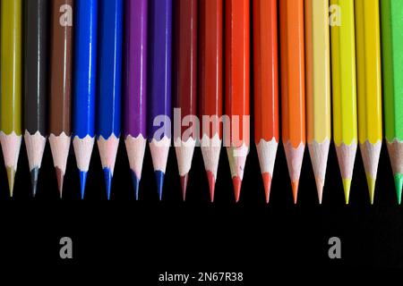 Color pencils isolated on black background. Close up Stock Photo