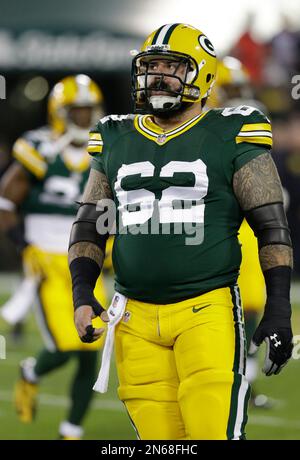 Green Bay Packers center Evan Dietrich-Smith (62) provides pass protection  for quarterback Aaron Rodgers during the second quarter of their game  against the Tennessee Titans at Lambeau Field on Sunday, December 23