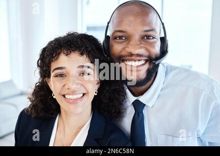 Selfie, portrait and call center consultants in the office working on a crm consultation online. Happy, smile and interracial telemarketing colleagues Stock Photo