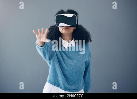Virtual reality headset, metaverse and woman with hand for mockup space and 3d game in studio. Gamer person vr glasses for digital world, futuristic Stock Photo