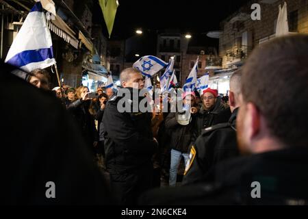 Israel. 09th Feb, 2023. Protestors being blocked during a march in Jerusalem streets by police officers. Houndreds demonstrated against the new Israeli right-wing government and judicial overhaul in Jerusalem. Feb 9th 2023. (Photo by Matan Golan/Sipa USA). Credit: Sipa USA/Alamy Live News Stock Photo