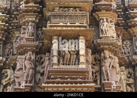 DEVI JAGDAMBA TEMPLE, South wall, Lord Brahma and consort Sculpture, Western Group, Khajuraho, Madhya Pradesh, India, UNESCO World Heritage Site. Stock Photo