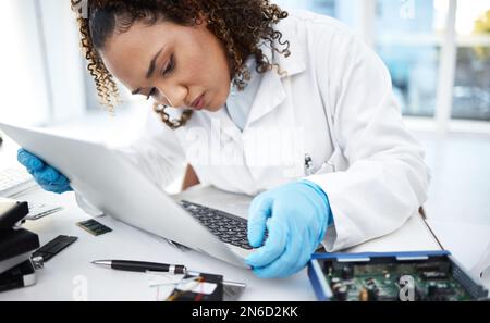Motherboard, woman technician and computer in lab for cyber crime investigation, analysis or IT solution. Information technology engineer, laptop or Stock Photo