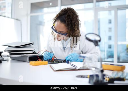 Computer hardware, repair and black woman electrician working on electronic cpu, circuit and chip. Technology maintenance, programming and female Stock Photo