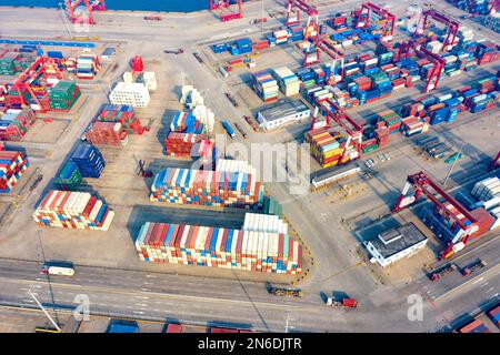 QINGDAO, CHINA - FEBRUARY 10, 2023 - Aerial photo taken on Feb. 10, 2023 shows the Qianwan container terminal of Qingdao Port in East China's Shandong Stock Photo