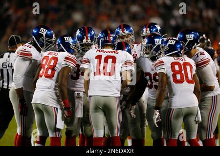 New York Giants players huddle up during an NFL football game