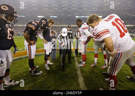 Chicago Bears players gather on the field before an NFL football game  against the Seattle Seahawks in Chicago, Sunday, Dec. 18, 2011. (AP  Photo/Kiichiro Sato Stock Photo - Alamy