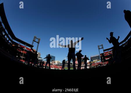 Pittsburgh Pirates players warm up during a workout at Busch Stadium,  Wednesday, Oct. 2, 2013, in St. Louis. Game 1 of the National League  Division Series baseball playoff between the Pirates and