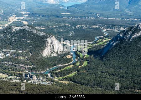 view from Banff Gondola terminal on Sulphur Mountain in Alberta Canada showing Bow River and Tunnel Mountain with Lake Minnewanka in the background Stock Photo