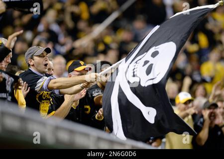 Pittsburgh Pirates mascot waves the pirate's flag, the Jolly Rogers  following the Pirates 7-0 win against the Houston Astros at PNC Park in  Pittsburgh on April 13, 2009. .(UPI Photo/Archie Carpenter Stock