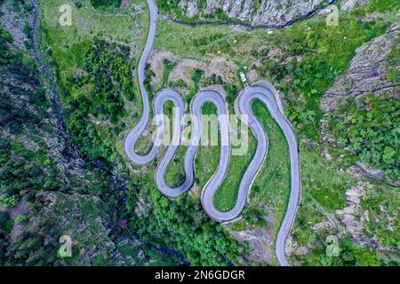 Drone shot, aerial photo, serpentine in the Pyrenees, country road in the mountains, Aragnouet, Departement Hautes-Pyrenees, France Stock Photo