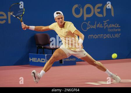 Montpellier, France - 09/02/2023, Holger Rune (DEN) in action against Marc-Andrea Huesler (SUI) during the Open Sud de France 2023, ATP 250 tennis tournament on February 9, 2023 at Sud de France Arena in Pérols near Montpellier, France - Photo Patrick Cannaux / DPPI Stock Photo