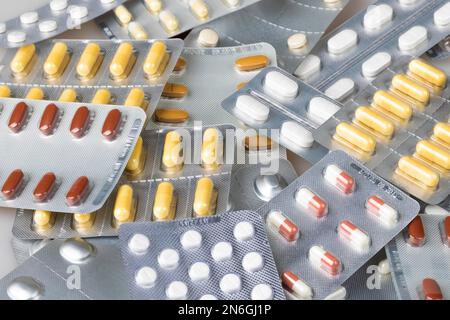 Colourful pills and capsules in blister packs Stock Photo