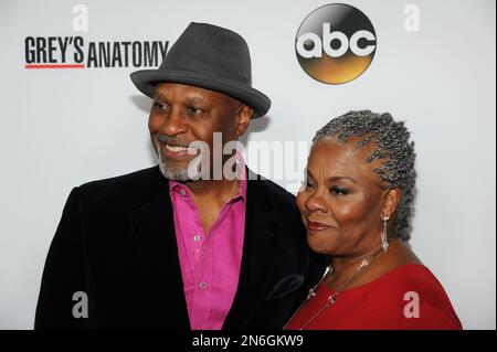 James Pickens, Jr., left, and Gina Taylor arrive at 