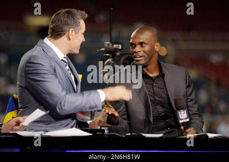 Former St. Louis Rams Isaac Bruce holds the Super Bowl trophy during  ceremonies celebrating the teams Super Bowl victory in the 1999-2000  season, at the Edward Jones Dome during half time of