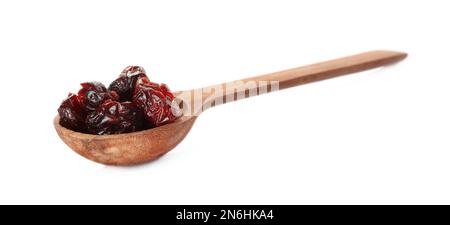 Dried cranberries in wooden spoon isolated on white Stock Photo