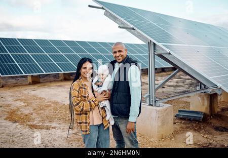 Black family, children or solar energy with a baby, mother and father on a farm together for sustainability. Kids, love or electricity with man, woman Stock Photo