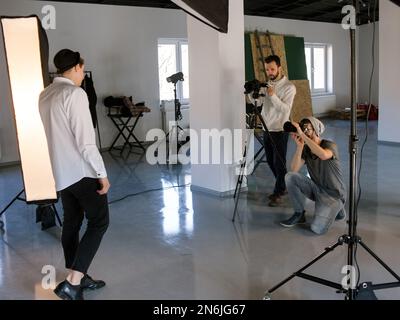 Professional photo and video production team work Stock Photo