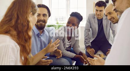 Close up shot of multiracial business people talking together Stock Photo