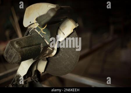 Items in garage. Workplace for creating structure. Production shop. Working tools on table. Stock Photo