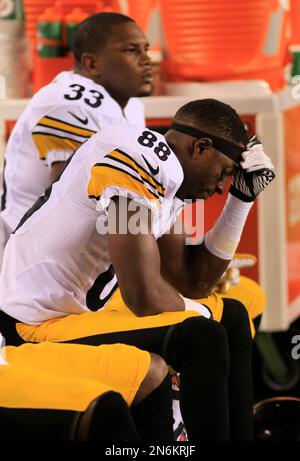 Wide receiver Isaac Curtis of the Cincinnati Bengals is tackled by