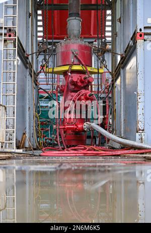 10 February 2023, Brandenburg, Potsdam: At the 'Construction Site Open Day', protection of the borehole can be seen at the construction site for deep geothermal energy. Since mid-December 2022, drilling has been underway at Heinrich-Mann-Allee on behalf of Stadtwerke Potsdam's Energie und Wasser GmbH. On the same day, residents of Potsdam were able to find out about the current status of the work at the open construction site day. Around 2000 meters are to be drilled into the depths here. The natural geothermal heat for is to be used later for the heat supply. Photo: Patrick Pleul/dpa/ZB Stock Photo