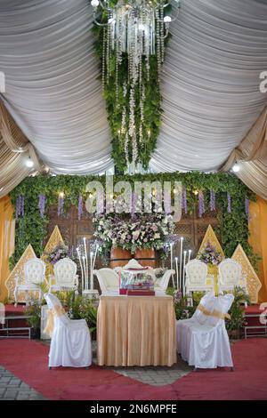Beautiful Wedding Decoration Arrangement with Flowers, Leaves and Lamps Stock Photo