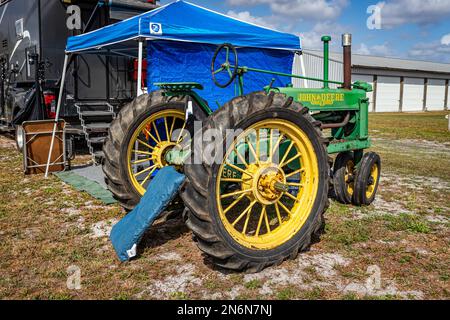 A 1937 John Deere Model A tractor with cultivators attached Stock