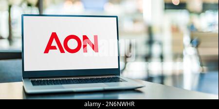 POZNAN, POL - JUN 28, 2022: Laptop computer displaying logo of Aon PLC,  a British multinational professional services firm that sells a range of fina Stock Photo