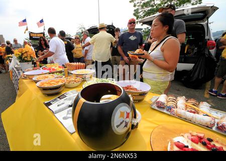 Pittsburgh Steelers fans tailgate outside Heinz Field before an