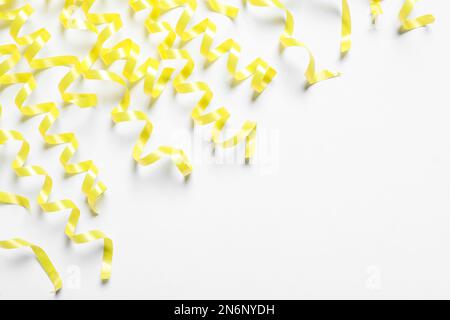 Beautiful Yellow Streamers Isolated On White Stock Photo, Picture