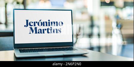 POZNAN, POL - NOV 22, 2022: Laptop computer displaying logo of Jeronimo Martins, a Portuguese corporate group that operates in food distribution and s Stock Photo