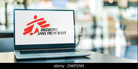POZNAN, POL - NOV 22, 2022: Laptop computer displaying logo of Medecins Sans Frontieres, an international humanitarian medical non-governmental organi Stock Photo