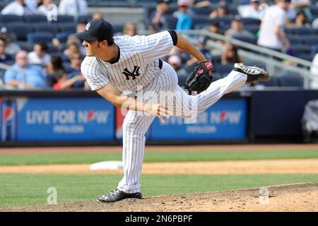 Bronx, USA. 04th Oct, 2019. New York Yankees Aaron Judge, Brett Gardner and Giancarlo  Stanton stand together in the outfield during pitcher change in the 5th  inning against the Minnesota Twins in