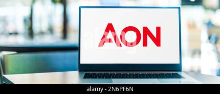 POZNAN, POL - JUN 28, 2022: Laptop computer displaying logo of Aon PLC,  a British multinational professional services firm that sells a range of fina Stock Photo