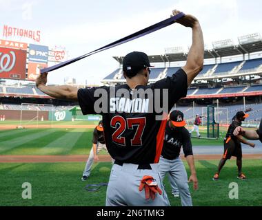 Miami Marlins right fielder Giancarlo Stanton stands during the singing of  the National Anthem before the start of a baseball game against the San  Diego Padres, Sunday, Aug. 27, 2017, in Miami. (