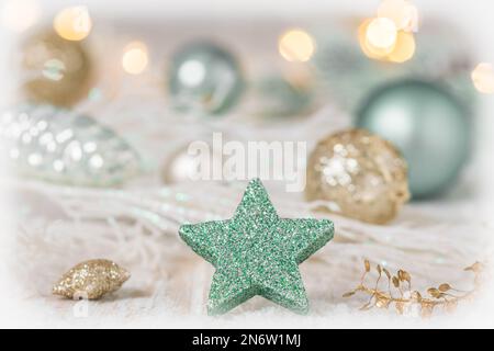 Christmas decoration with light green colors on abstract background, soft focus Stock Photo