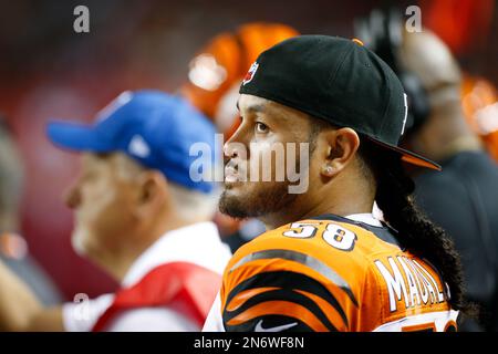 Cincinnati Bengals linebacker Rey Maualuga adjusts his hair during practice  at NFL football training camp on Wednesday, Aug. 10, 2011, in Georgetown,  Ky. (AP Photo/Al Behrman Stock Photo - Alamy