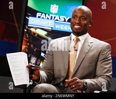 Former NFL player Akbar Gbaja-Biamila and Michael Fabiano are seen at the  Panel discussion and Fantasy Live taping on August 22, 2013, in New York  City. (Brian Ach/AP Images for NFL Stock