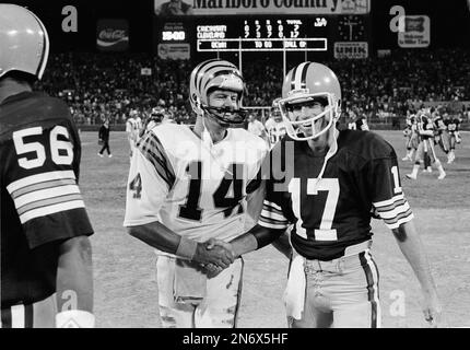 Cincinnati Bengals quarterback Ken Anderson has his head turned almost  completely around by Piuttsburgh Steeler defender Keith Gary (92) during  the second quarter of their NFL game at Riverfront Dtadium in Cincinnati