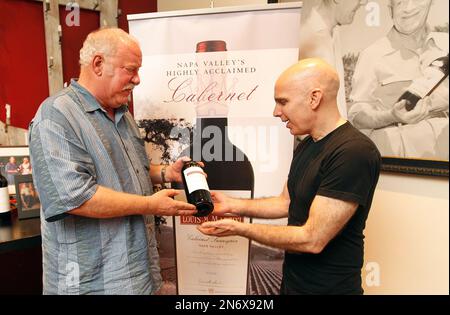 https://l450v.alamy.com/450v/2n6x92m/image-distribution-for-louis-m-martini-third-generation-master-winemaker-michael-martini-left-presents-multiple-grammy-award-nominee-joe-satriani-right-with-a-bottle-of-award-winning-louis-m-martini-napa-valley-cabernet-sauvignon-on-saturday-aug-17-2013-in-st-helena-california-satriani-joined-martini-for-the-wine-wisdom-and-rock-experience-a-combined-rock-n-roll-and-winemaking-fantasy-camptony-avelarap-images-for-louis-m-martini-2n6x92m.jpg