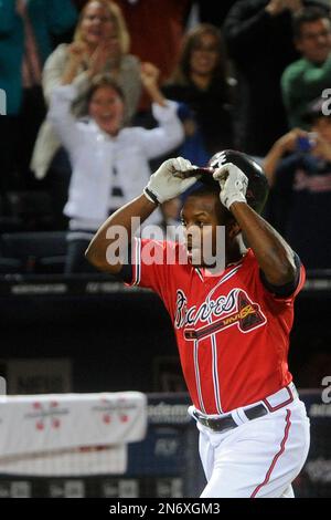 Justin Upton #8 of the Atlanta Braves hits a walk-off homer